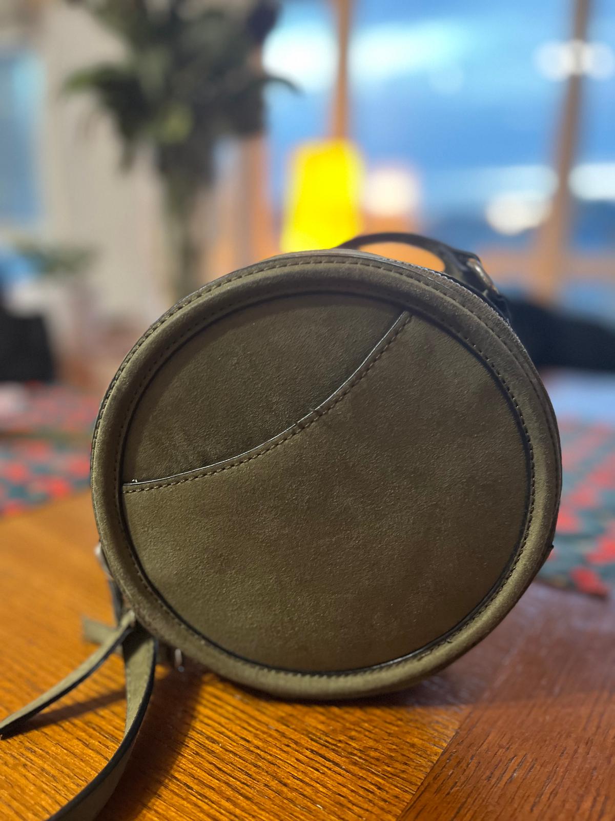 Photo of Kakhi round handbag